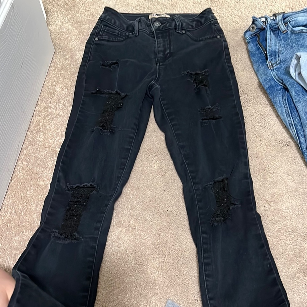 Blue spice distressed skinny jeans